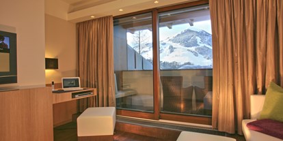 Hotels an der Piste - Hotel-Schwerpunkt: Skifahren & Kulinarik - Juniorsuite "Gamshag" 
Blick zum Zwölferkogel - Erstklassig & down to Earth - das bio-zertifizierte Gartenhotel Theresia****S 