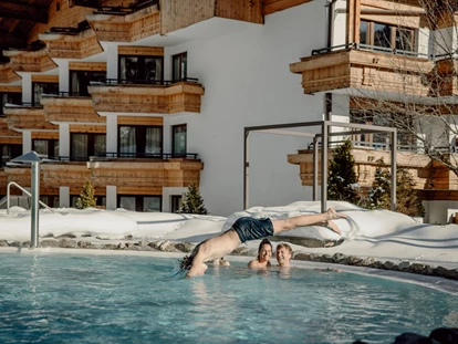 Hotels an der Piste - Rodeln - Kirchberg in Tirol - Erstklassig & down to Earth - das bio-zertifizierte Gartenhotel Theresia****S 