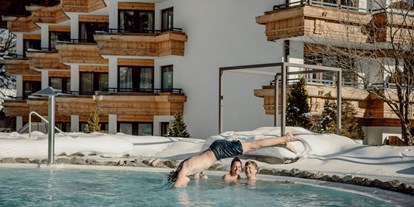 Hotels an der Piste - Hotel-Schwerpunkt: Skifahren & Familie - Erstklassig & down to Earth - das bio-zertifizierte Gartenhotel Theresia****S 