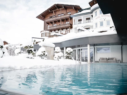 Hotels an der Piste - Skiservice: Skireparatur - Oberhof (Goldegg) - sonnhofalpendorf-sonnhof-josalzburg-skiamade-snowspacesalzburg-adultsonly-wellnesshotel-skihotel-anderpiste - Sonnhof Alpendorf - adults only place