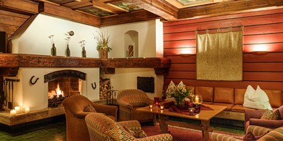Hotels an der Piste - Sauna - Treffen (Treffen am Ossiacher See) - Hotelhalle mit offenen Kamin - Hotel St. Oswald