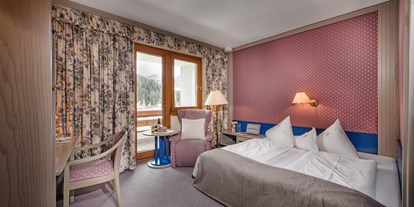 Hotels an der Piste - Parkplatz: kostenlos beim Hotel - PLZ 9565 (Österreich) - Zweites Schlafzimmer in der Familien-Luxussuite "Max & Moritz" - Hotel St. Oswald