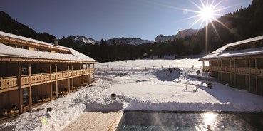 Hotels an der Piste - Skigebiet Seiser Alm - Schwimmbad, gewärmt auf 33°C. 
 - Tirler - Dolomites Living Hotel