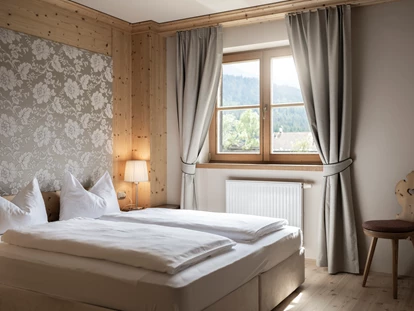 Hotels an der Piste - Skiverleih - Post Alpina - Family Mountain Chalets