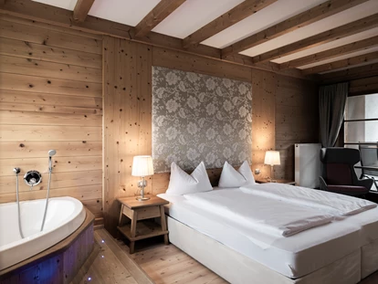 Hotels an der Piste - Skiverleih - Post Alpina - Family Mountain Chalets