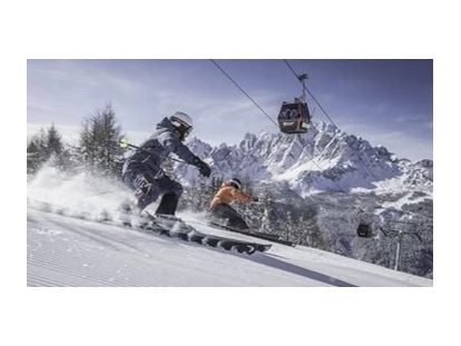 Hotels an der Piste - Skiverleih - Skifahren - Post Alpina - Family Mountain Chalets