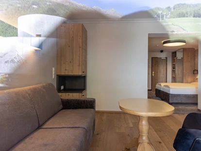 Hotels an der Piste - Skikurs direkt beim Hotel: für Kinder - Wohnbereich Junior Suite Schwarzkogel - stefan Hotel