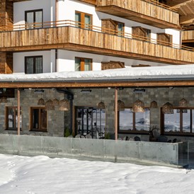 Skihotel: Sonnenterrasse im Winter - Ski & Bike Hotel Wiesenegg
