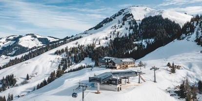 Hotels an der Piste - Verpflegung: Halbpension - Itter - Die KRAFTalm  und liegt mitten in der SkiWelt Wilder Kaiser - Brixental direkt an der Mittelstation der neuen 10er Gondelbahn Salvistabahn - KRAFTalm