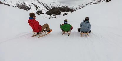 Hotels an der Piste - Mellau - Rodelparty darf im Winter auch nicht Fehlen - Hotel Warther Hof