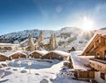 Skihotel: Das Chalet Dorf erstrahlt im Winterkleid - Alpin Chalets Oberjoch