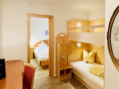 Hotels an der Piste - Skikurs direkt beim Hotel: für Kinder - Wellness- und Familienhotel Egger in TOP LAGE