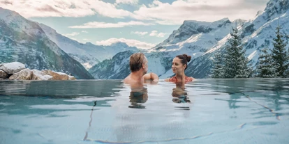Hotels an der Piste - Mellau - Infinitypool mit Whirlpoolfunktion - Hotel Goldener Berg