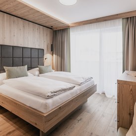 Skihotel: Schlafzimmer Appartement Suite - FIRSTpeak Zauchensee