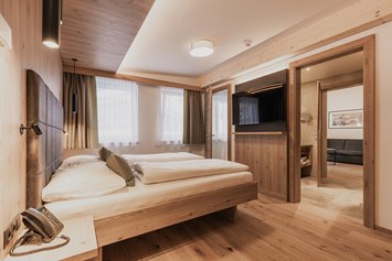 Skihotel: Schlafzimmer Junior Suite - FIRSTpeak Zauchensee