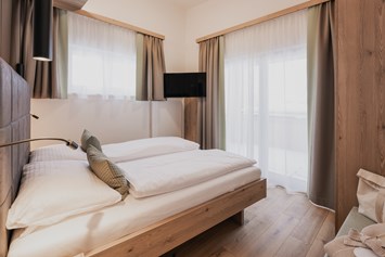 Skihotel: Schlafzimmer Panorama Suite - FIRSTpeak Zauchensee