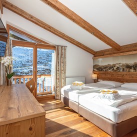 Skihotel: Zimmerbeispiel der Ferienwohnung 80 im Dachgeschoss - Ferienwohnungen Perfeldhof