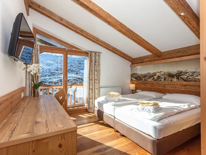 Hotels an der Piste - PLZ 6373 (Österreich) - Zimmerbeispiel der Ferienwohnung 80 im Dachgeschoss - Ferienwohnungen Perfeldhof