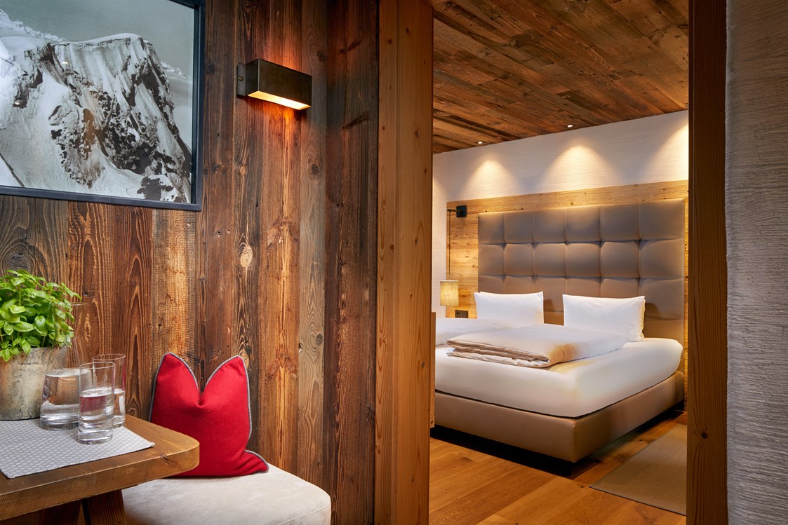 Skihotel: Schlafzimmer mit Doppelbett (teilweise mit Stockbett) - Promi Alm Flachau