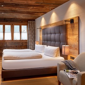 Skihotel: Schlafzimmer mit Doppelbett - Promi Alm Flachau