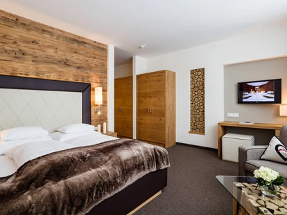 Hotels an der Piste - Skikurs direkt beim Hotel: für Kinder - Zimmer und Suiten im Alpinen Life-Style Design im Hotel Panorama Obertauern - Hotel Panorama