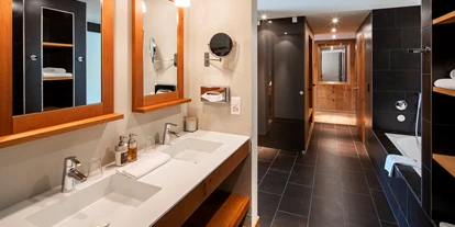 Hotels an der Piste - Skiverleih - Badezimmer - Frutt Mountain Resort