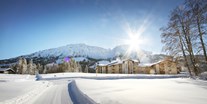 Hotels an der Piste - Skigebiet Oberjoch Bad Hindelang - Panoramahotel Oberjoch von Weitem - Panorama Hotel Oberjoch