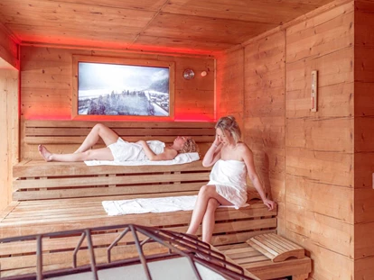 Hotels an der Piste - Verpflegung: Halbpension - Itter - Panoramasauna mit Aufgüssen von Saunameister Rudi - Alpin Family Resort Seetal ****s