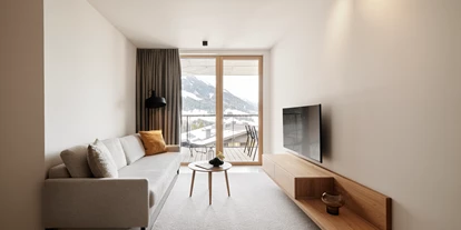 Hotels an der Piste - Skiverleih - Wohnzimmer eines Appartements - Haven Mountain Retreat