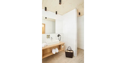 Hotels an der Piste - Skiverleih - Badezimmer - das Tauernherz