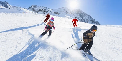 Hotels an der Piste - Skiverleih - Pistenspaß für die ganze Familie im Skigebiet Kühta - Hotel Konradin****