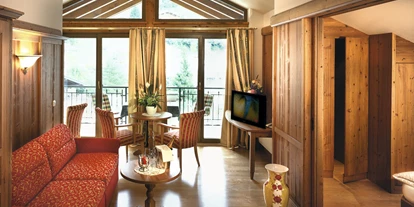 Hotels an der Piste - Skiverleih - Familienzimmer Bergblick - Aktivhotel Alpendorf