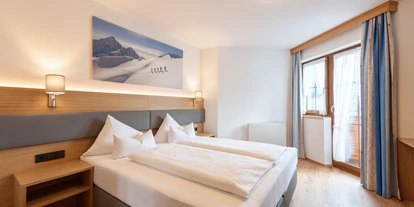 Hotels an der Piste - Sauna - Kappl (Kappl) - Schlafzimmer - Familienappartement Landhaus Strolz St. Anton am Arlberg - Hotel Garni Landhaus Strolz
