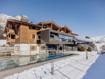 Hotels an der Piste - PLZ 6373 (Österreich) - Familien-Wellnessbereich: Pinzgauer Wasserfestspiele - Good Life Resort die Riederalm ****S