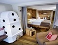 Skihotel: Zimmerbild - Heimatg'fühl mit Wintergarten - Hotel Alpenfriede