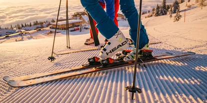 Hotels an der Piste - Skiverleih - Erste Schwünge auf den frisch präparierten Pisten der Gerlitzen Alpe  - Mountain Resort Feuerberg