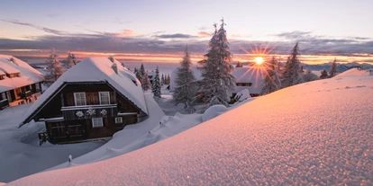 Hotels an der Piste - Skiverleih - Chaletdorf im Winter - Mountain Resort Feuerberg