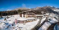 Hotels an der Piste - Hotel-Schwerpunkt: Skifahren & Ruhe - Das ****Hotel Hubertus - Außenansicht - Hotel Hubertus