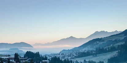 Hotels an der Piste - Mellau - Blick aus dem Tal im Winter Richtung Allgäu - Ski- und Aktivhotel Almhof Rupp