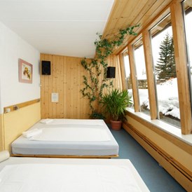 Skihotel: Wintergarten mit Wasserbett - Aparthotel Hutter
