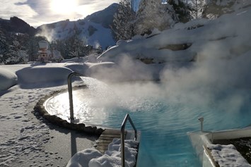 Skihotel: Outdoorpool im Schnee 30°C - The RESI Apartments "mit Mehrwert"