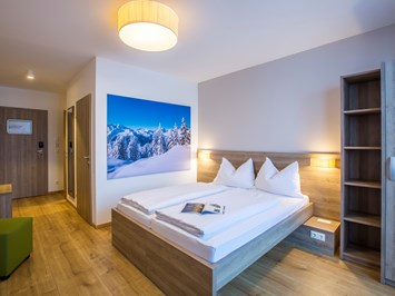 COOEE alpin Hotel Kitzbüheler Alpen Zimmerkategorien Standard Zimmer
