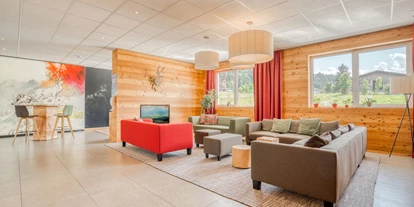 Hotels an der Piste - Verpflegung: Halbpension - Itter - Lobby - COOEE alpin Hotel Kitzbüheler Alpen