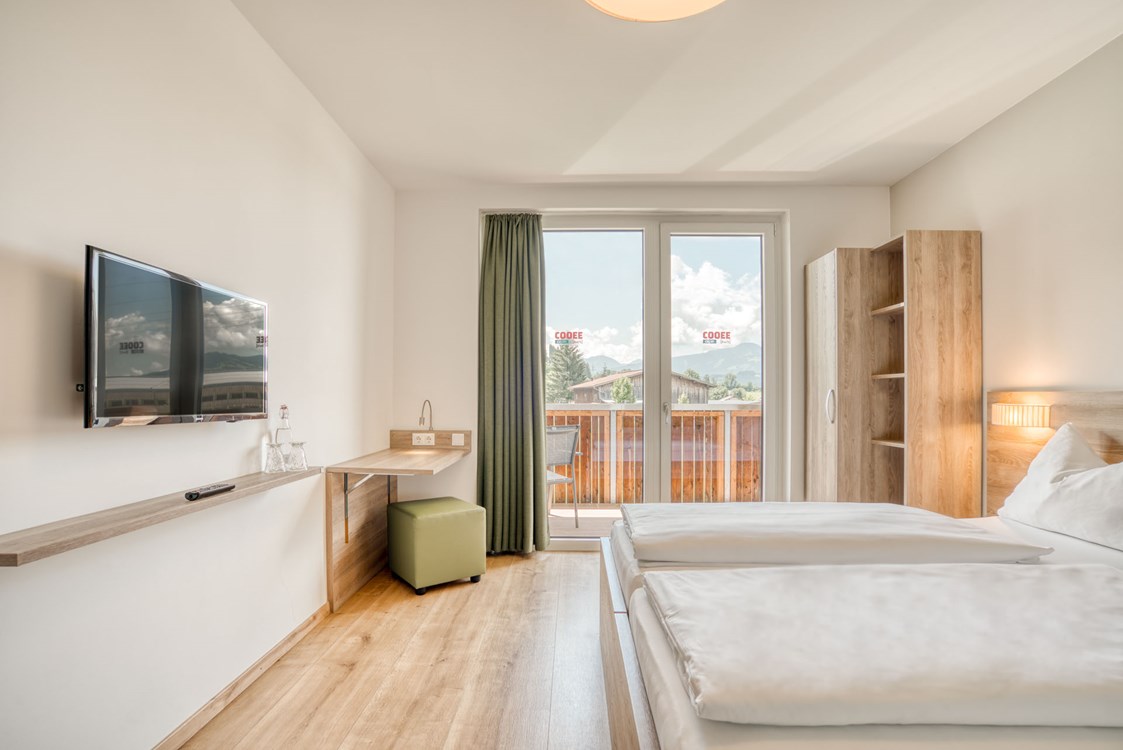 Skihotel: Standard Zimmer - COOEE alpin Hotel Kitzbüheler Alpen