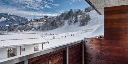 Hotels an der Piste - Verpflegung: Halbpension - Itter - Ausblick vom Balkon im Standard Zimmer - COOEE alpin Hotel Kitzbüheler Alpen