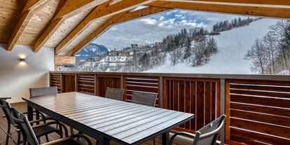 Hotels an der Piste - Verpflegung: Halbpension - Itter - Ausblick vom Balkon des Apartments - COOEE alpin Hotel Kitzbüheler Alpen