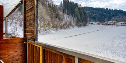Hotels an der Piste - Verpflegung: Halbpension - Itter - Ausblick vom Balkon des Apfeldorf Zimmers - COOEE alpin Hotel Kitzbüheler Alpen