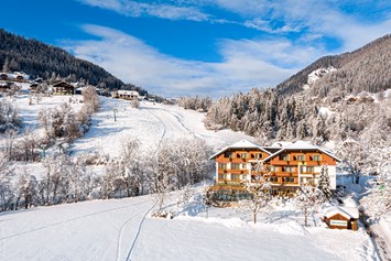 Skihotel: Hotel Almrausch - an der Sonnwiesenabfahrt (Verbindung zu den Skiliften in St.Oswald und Skiliften in Bad Kleinkirchheim) - Genusshotel Almrausch
