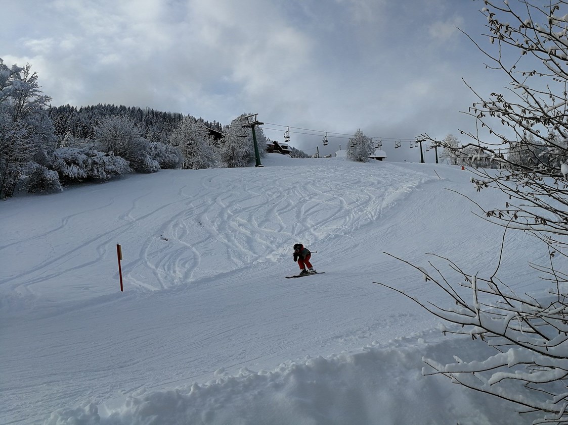Skihotel: Skipiste - nur wenige Meter vom Hotel - Genusshotel Almrausch