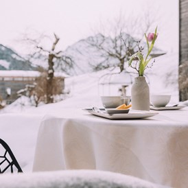 Skihotel: Tisch auf der  - Das Naturhotel Chesa Valisa****s